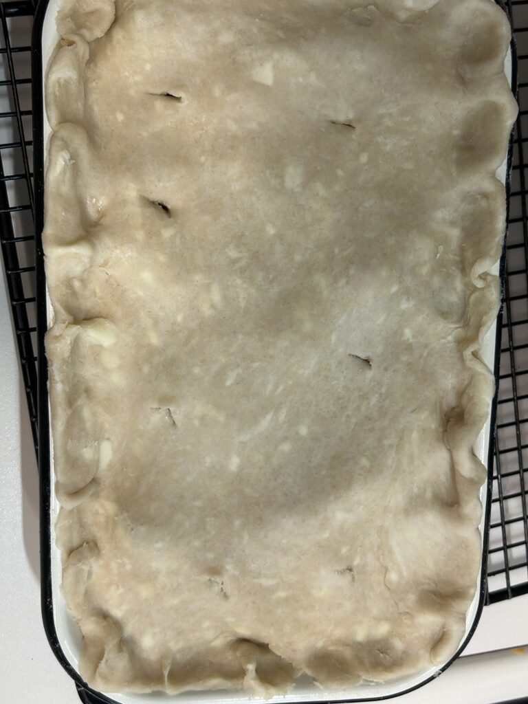 creamy chicken broccoli pie ready to bake.