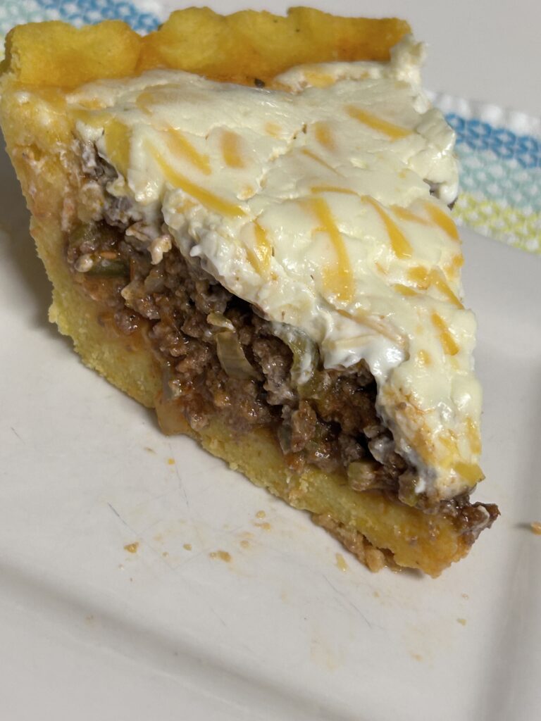 close-up of a slice of Venezuelan Polenta Pie . 