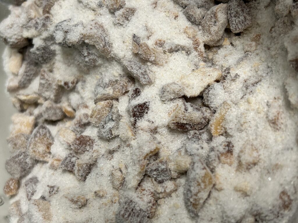 mixed nuts and sugar in a bowl.